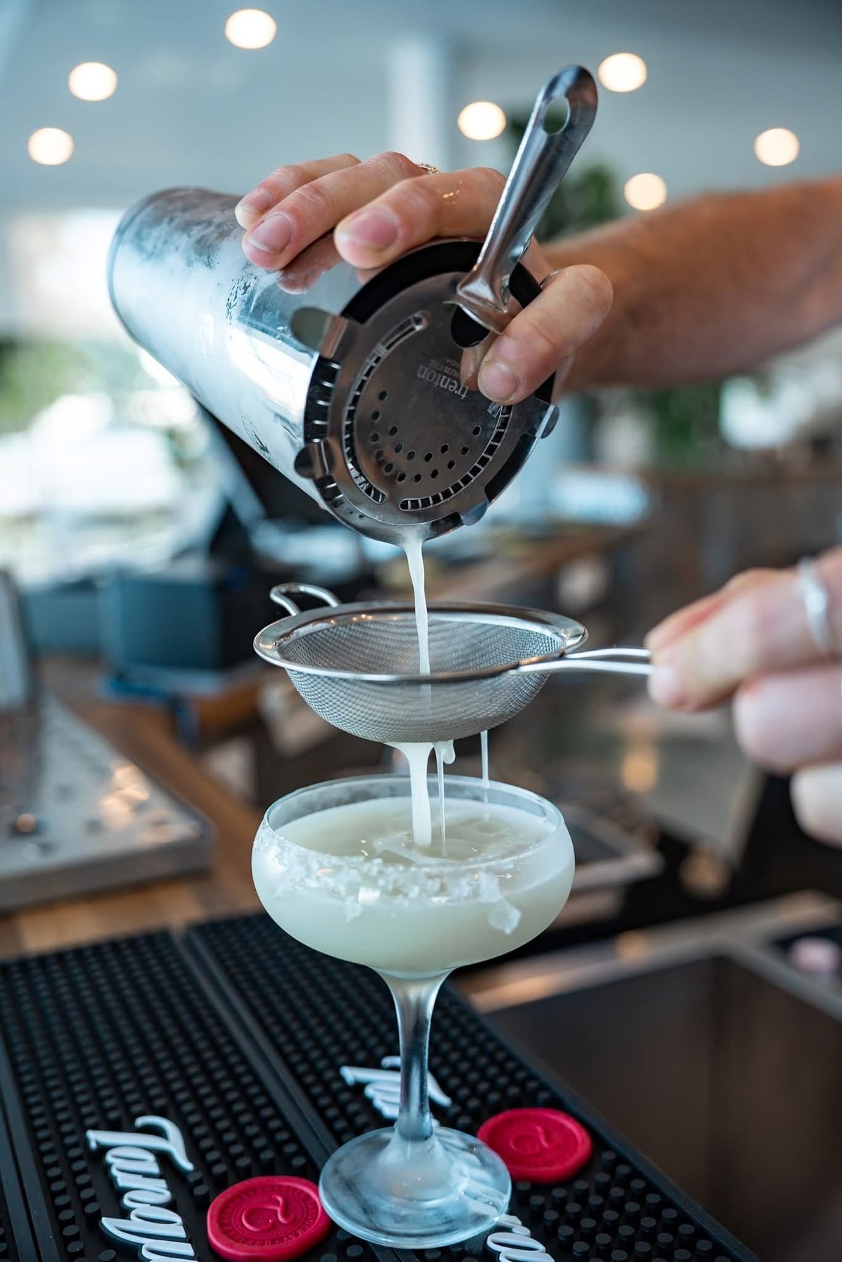 Cocktail being poured at the Marina bar